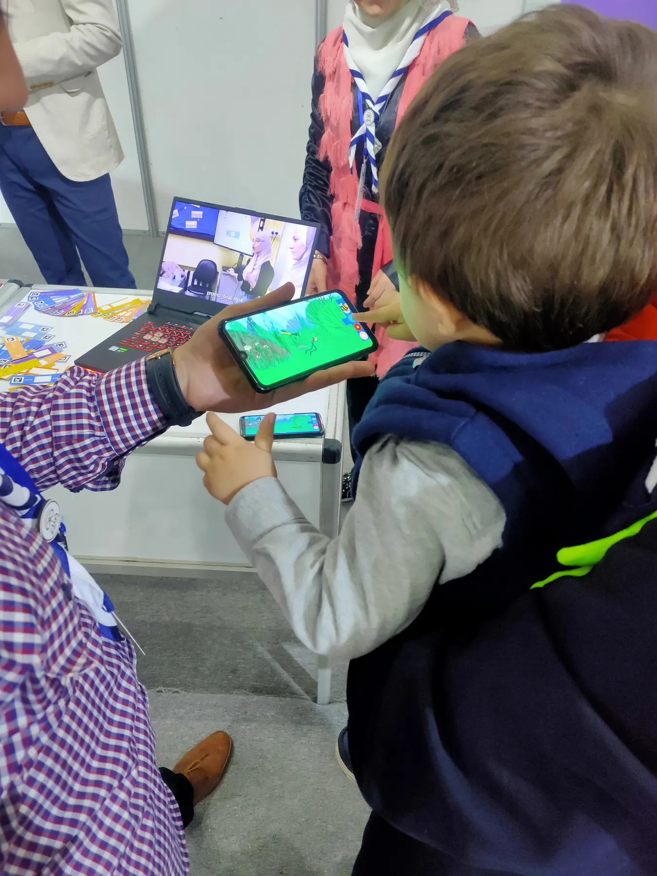 Children learning to code with the CoKids kit